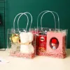 Wholesale of pvc transparent handbags, flower bags, gift bags, waterproof snap fasteners and portable three-piece sets in stock details Picture